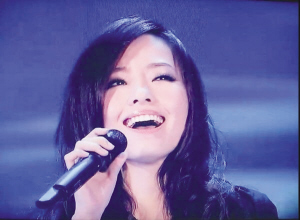 张靓颖在奥普拉脱口秀上飙海豚音