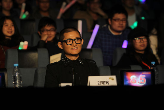 刘明辉任评委