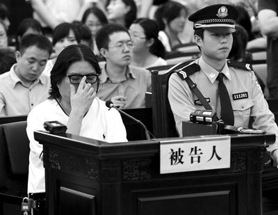 在整个庭审过程中高晓松表情沉重 本版图片由新华社发