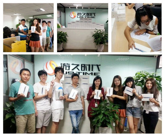 排队领取iPad大奖游久员工人手一份