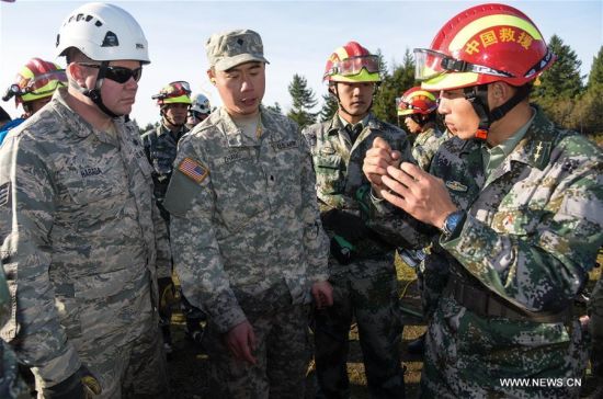 中美两军第三次人道主义救援减灾联合实兵演练日前在美军刘易斯—麦科德联合基地举行。