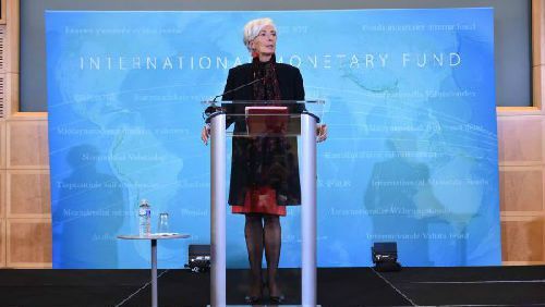 1月30日，国际货币基金组织总裁拉加德在华盛顿召开新闻发布会，宣布将人民币纳入特别提款权货币篮子。（法新社）