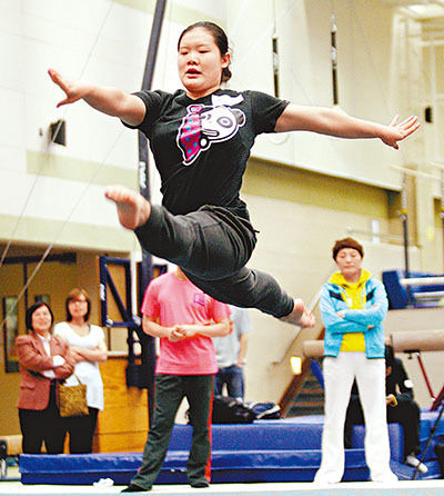 程菲展身手让教练意外。图片来源：香港《文汇报》