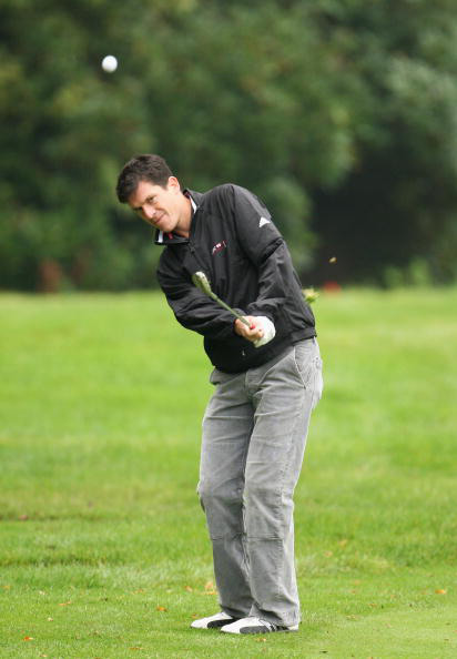 图文世界比洞赛球星备战蒂姆亨曼短铁击球