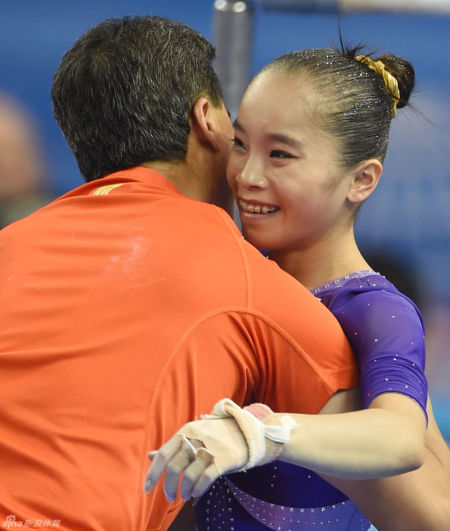 姚金男和教练庆祝