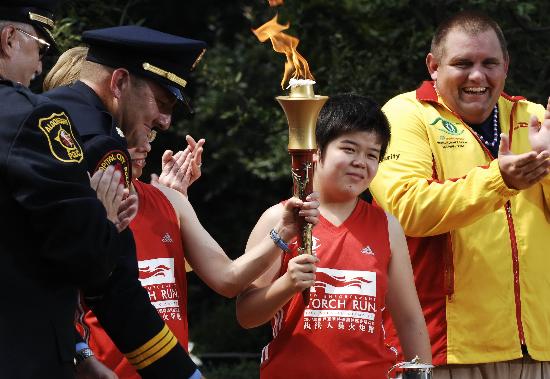 当日,2007年上海世界夏季特殊奥林匹克运动会第二阶段国际火炬跑在