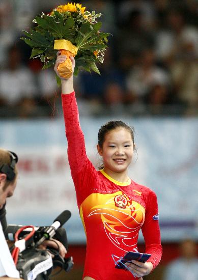 图文体操世锦赛程菲跳马三连冠捕捉程菲骄傲一刻
